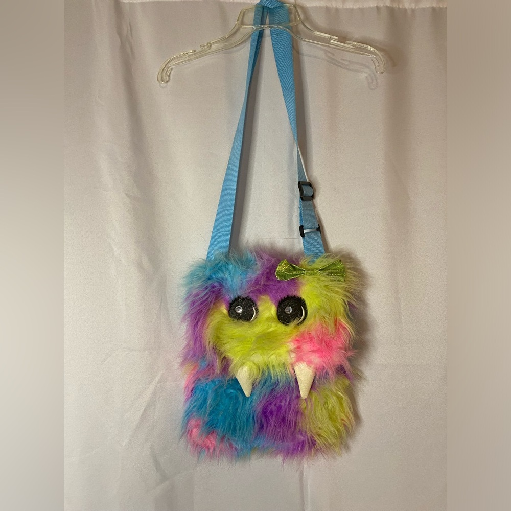 Justice homework monster bag/purse.
